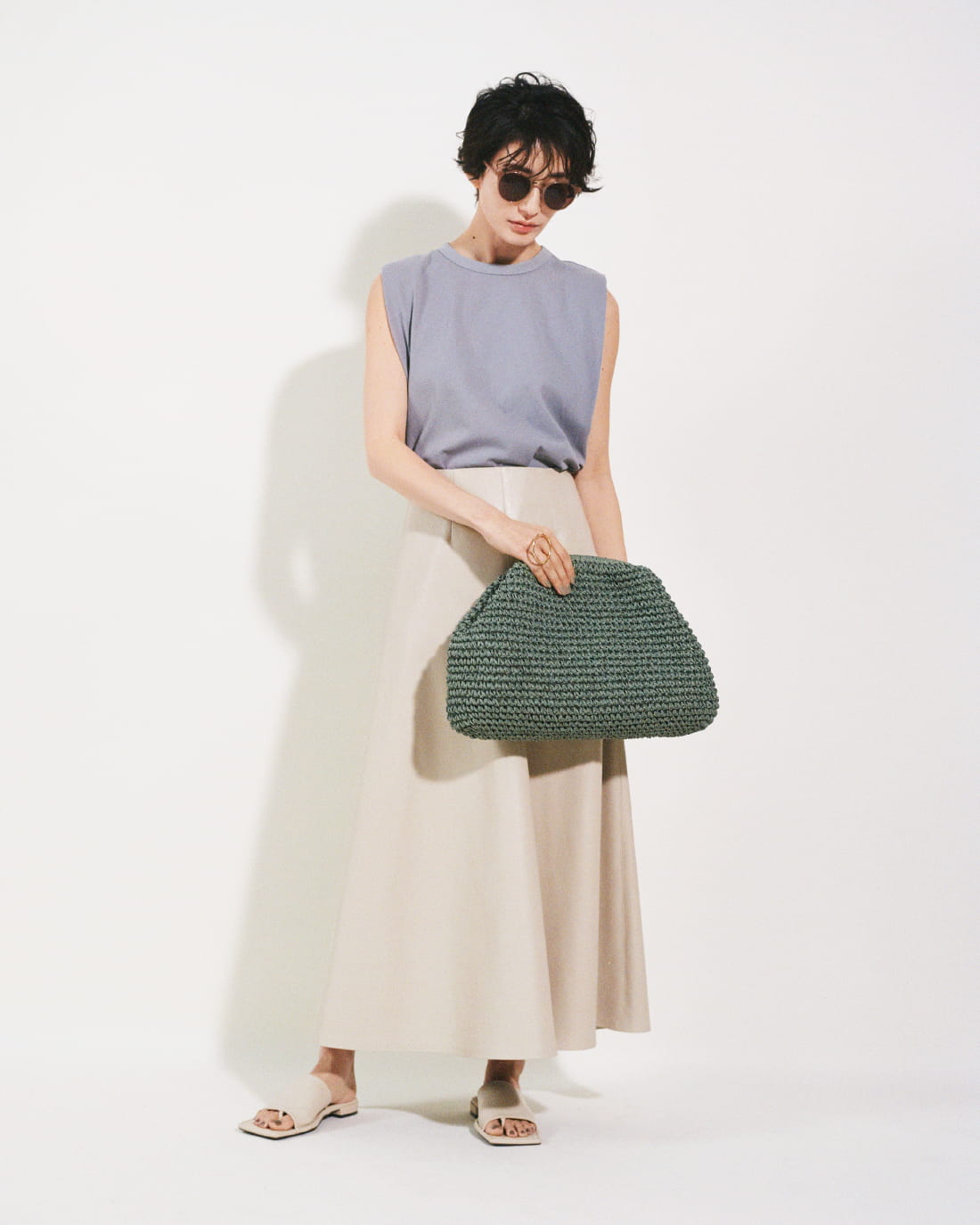 Tops 5,720yen (tax in), Skirt 9,460yen (tax in), Sunglasses 4,620yen (tax in), Pierced earrings 4,180yen (tax in), Rings 3,520yen (tax in), Bag 9,680yen (tax in), and Sandals 10,120yen (tax in)